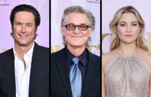 Oliver Hudson standing on a red carpet + Kurt Russell standing on a red carpet + Kate Hudson standing on a red carpet