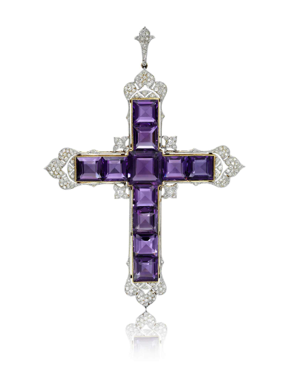 Attallah cross pendant against a white backdrop