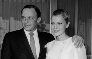 Frank Sinatra and Mia Farrow standing together