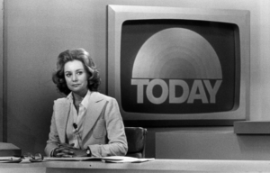 Barbara Walters sitting at a news anchor desk in front of a screen that reads "TODAY"