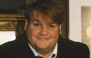 Headshot of Chris Farley.