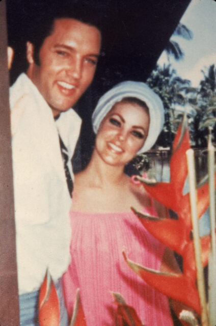 Elvis Presley and Priscilla Beaulieu standing together