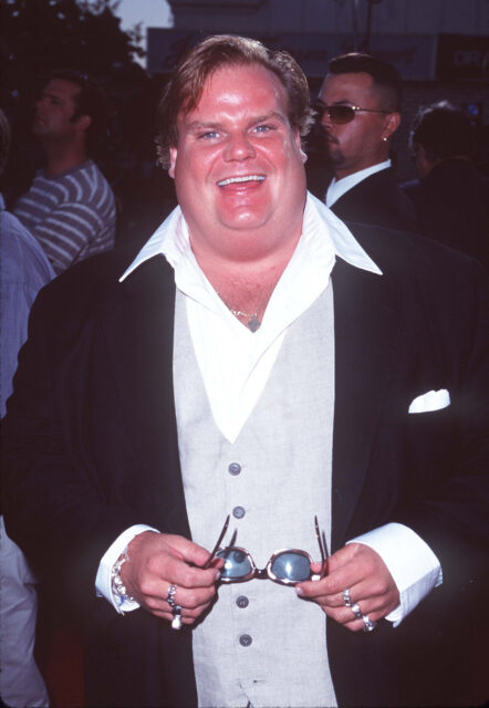 Chris Farley on a red carpet.