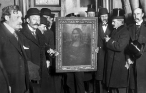 Men standing around the Mona Lisa.