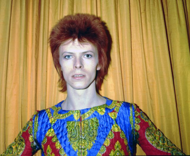 Headshot of David Bowie as Ziggy Stardust.